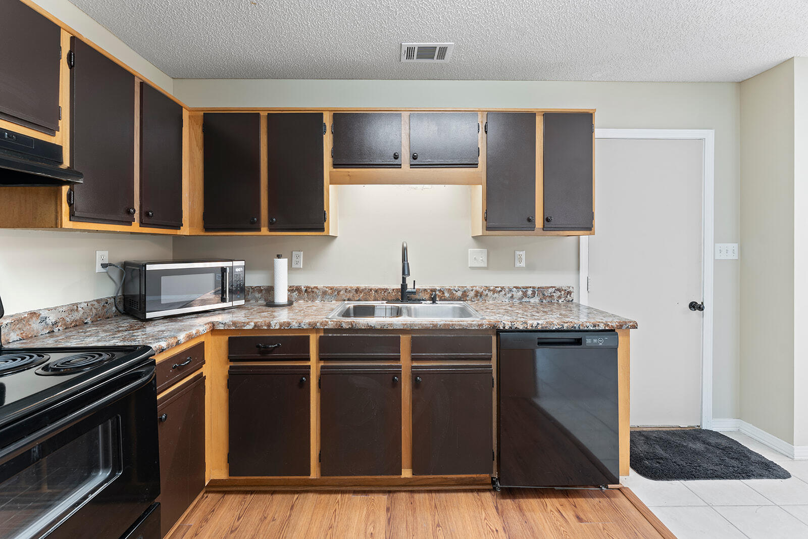 109 Nicole Lane Crestview, FL 32539 - Photo 25 of 60 a kitchen with stainless steel appliances granite countertop a stove and a sink