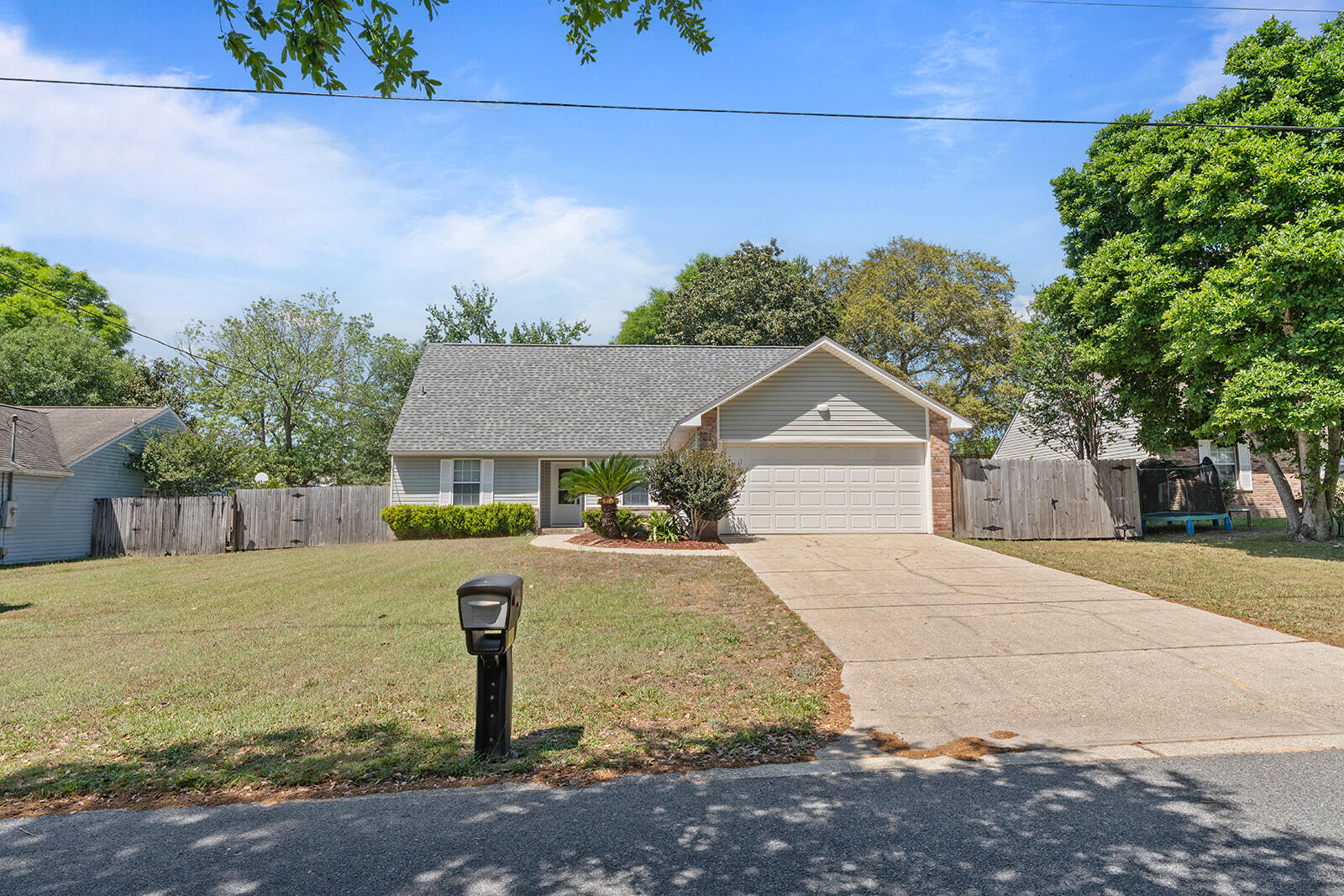 109 Nicole Lane Crestview, FL 32539 - Photo 60 of 60 a front view of a house with garden