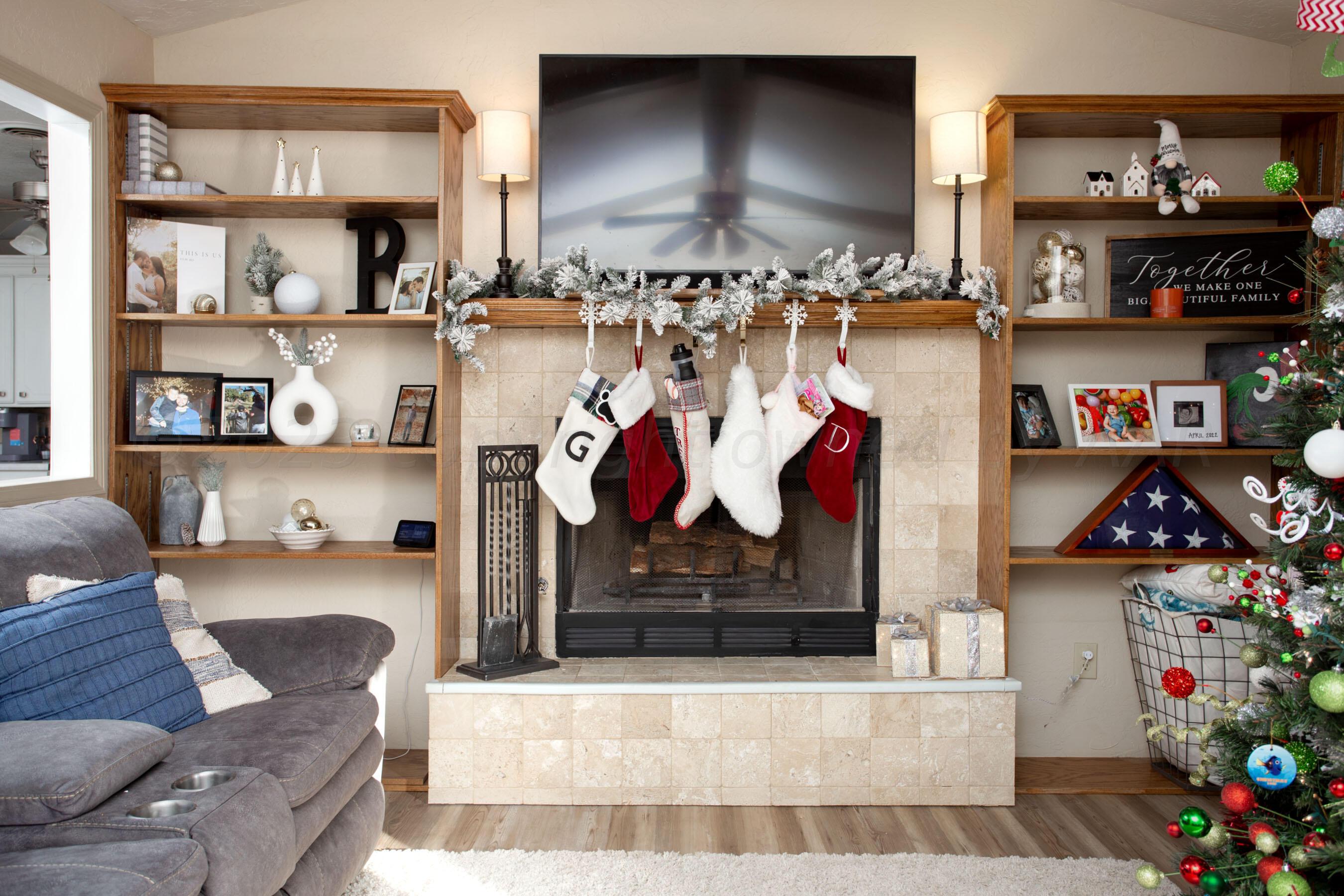 6101 Rutgers Street Amarillo, TX 79109 - Photo 1 of 24 a living room with lots of different furniture and a kitchen view