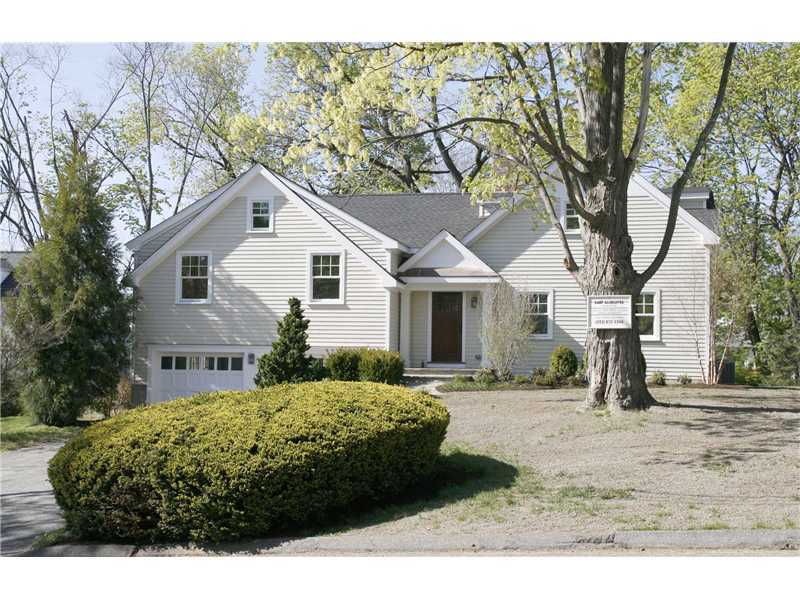 11 Bayside Terrace Riverside, CT 06878 - Photo 12 of 12 a front view of a house with a yard