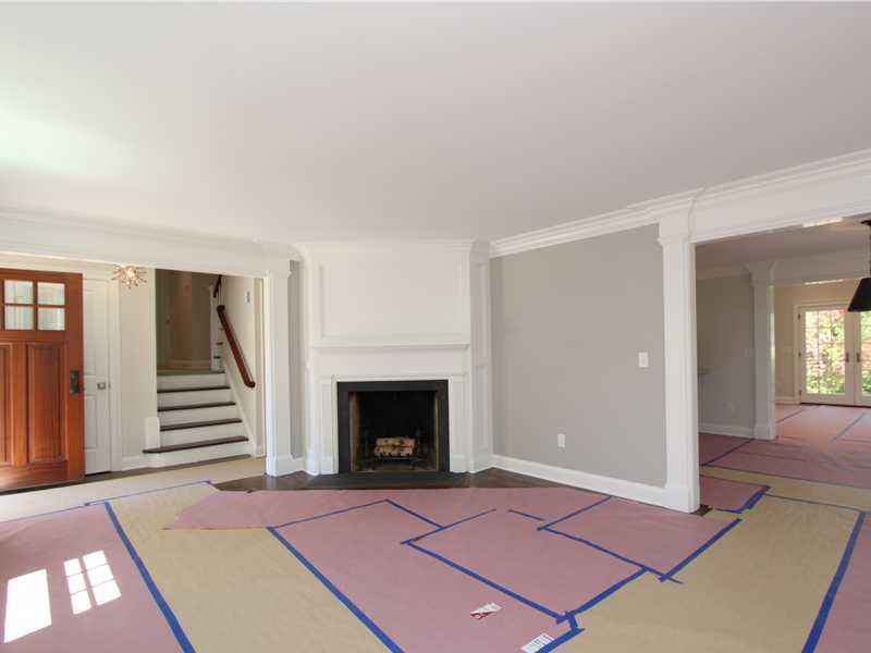 11 Bayside Terrace Riverside, CT 06878 - Photo 2 of 12 an empty room with windows and fireplace
