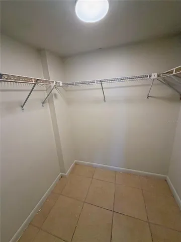 a view of a room with racks on the wall