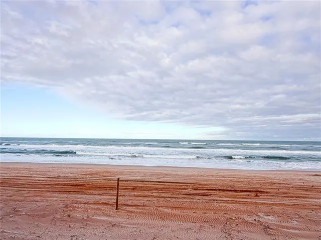 a view of beach and ocean
