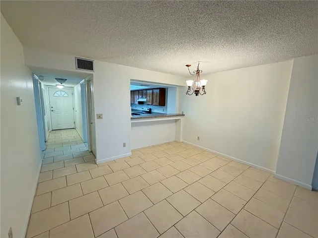 a view of a kitchen with a sink