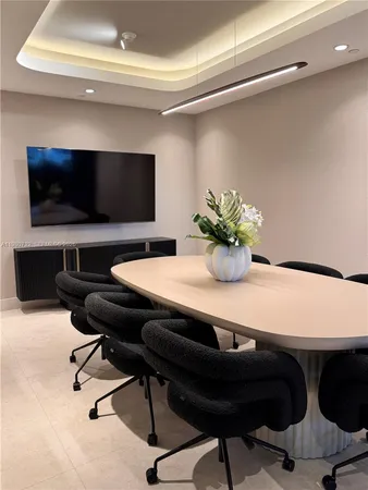 a view of a bathroom with bathtub and shower