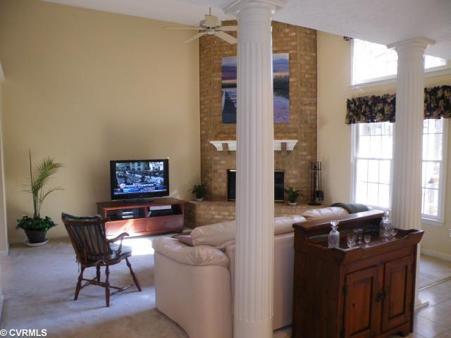 20141 Ivan Road Petersburg, VA 23803 - Photo 7 of 12 Den/Family/Great Room - 16x14 Impressive Family Room with 12' ceilings, columns and stunning brick fireplace (the second fireplace in home), opens to gourmet kitchen