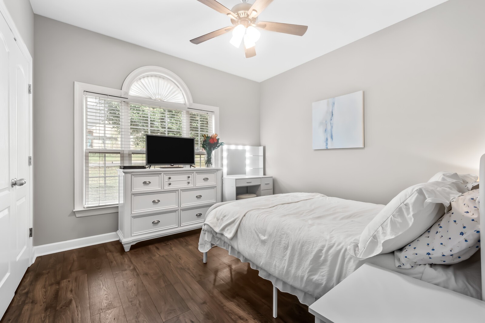 611 Windtree Pass Mount Juliet, TN 37122 - Photo 33 of 63 a bedroom with a bed and a flat screen tv