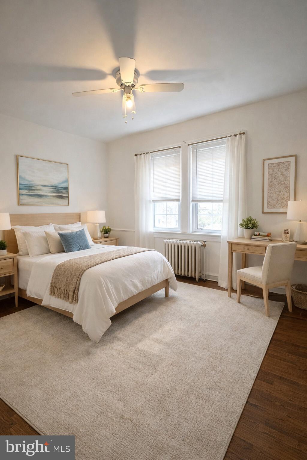 447 West Chester Pike Havertown, PA 19083 - Photo 7 of 16 a bedroom with a large bed and a chandelier