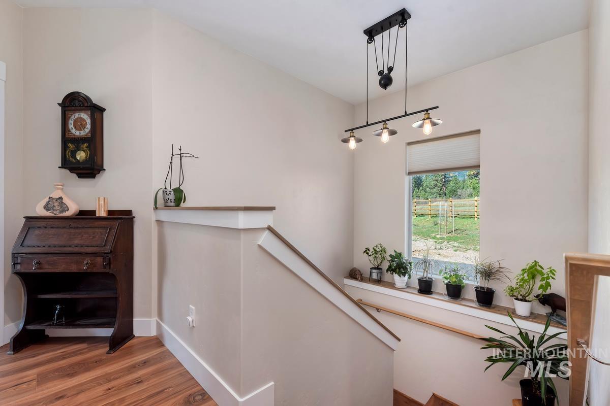 21 Open Road Garden Valley, ID 83622 - Photo 29 of 49 Stairway featuring wood finished floors and baseboards