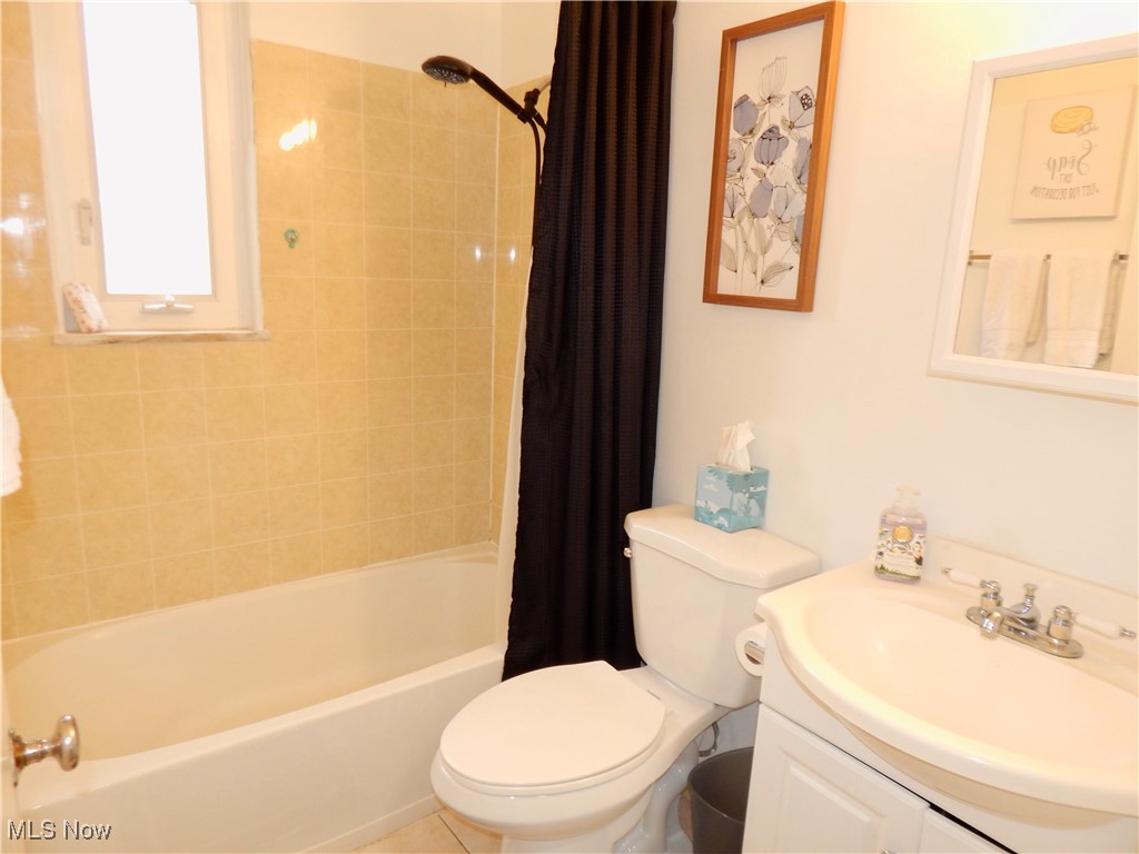 5961 Broadview Road Parma, OH 44134 - Photo 15 of 34 Full bath with shower / bath combo, vanity, and tile patterned floors