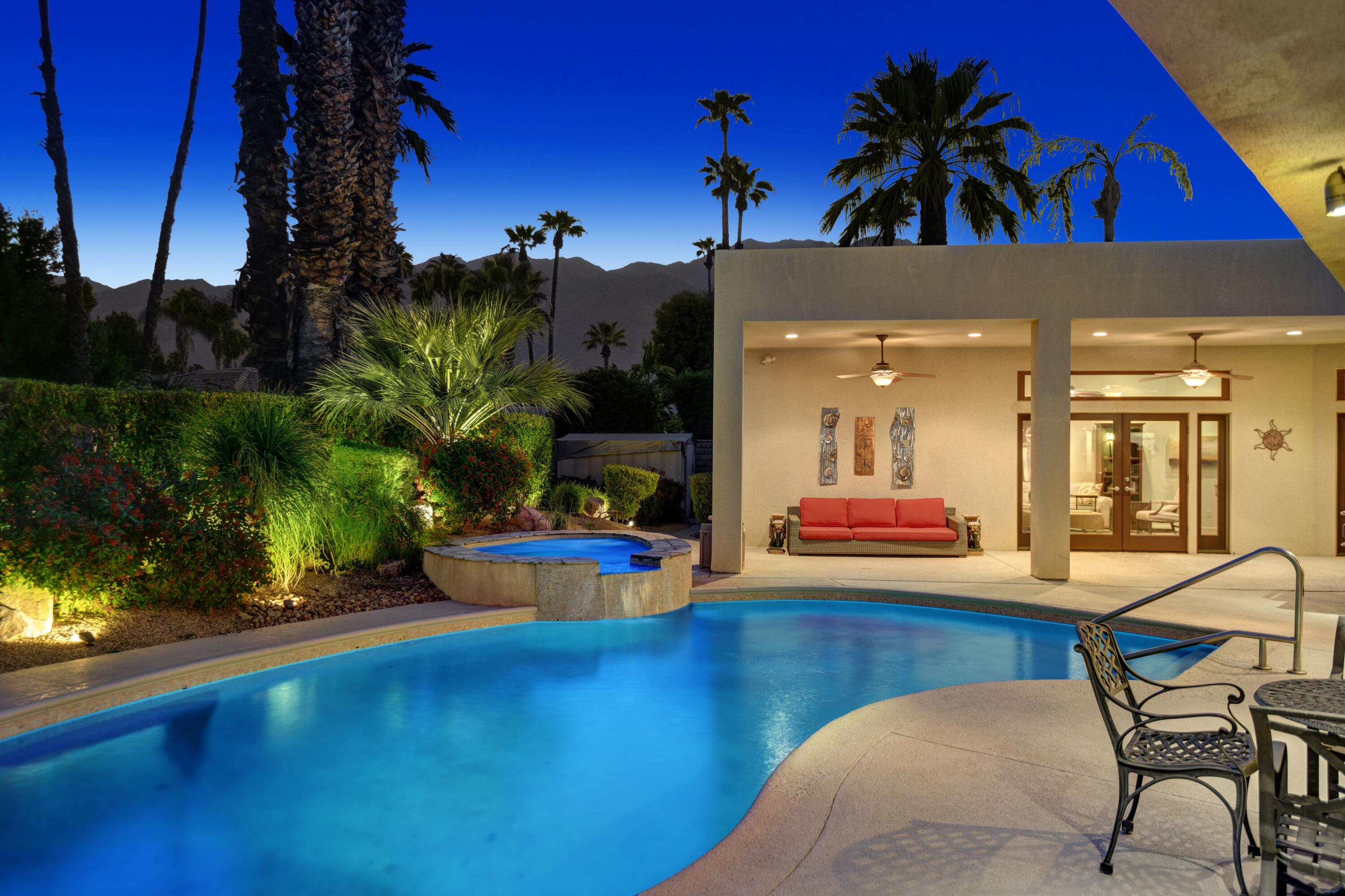 2915 Guadalupe Road Palm Springs, CA 92264 - Photo 2 of 52 a view of a chairs and table in the patio