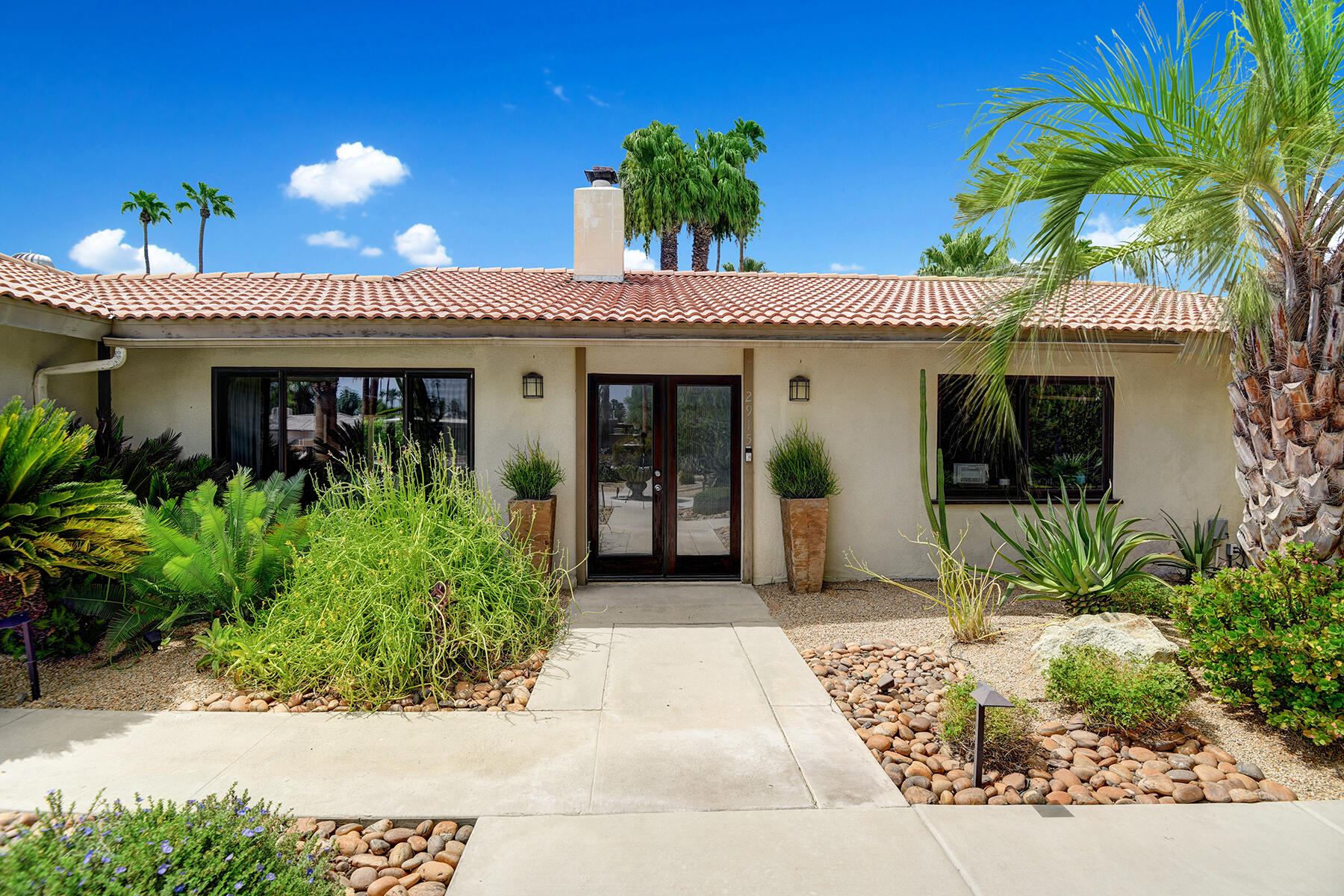 2915 Guadalupe Road Palm Springs, CA 92264 - Photo 14 of 52 a view of a entryway door front of house