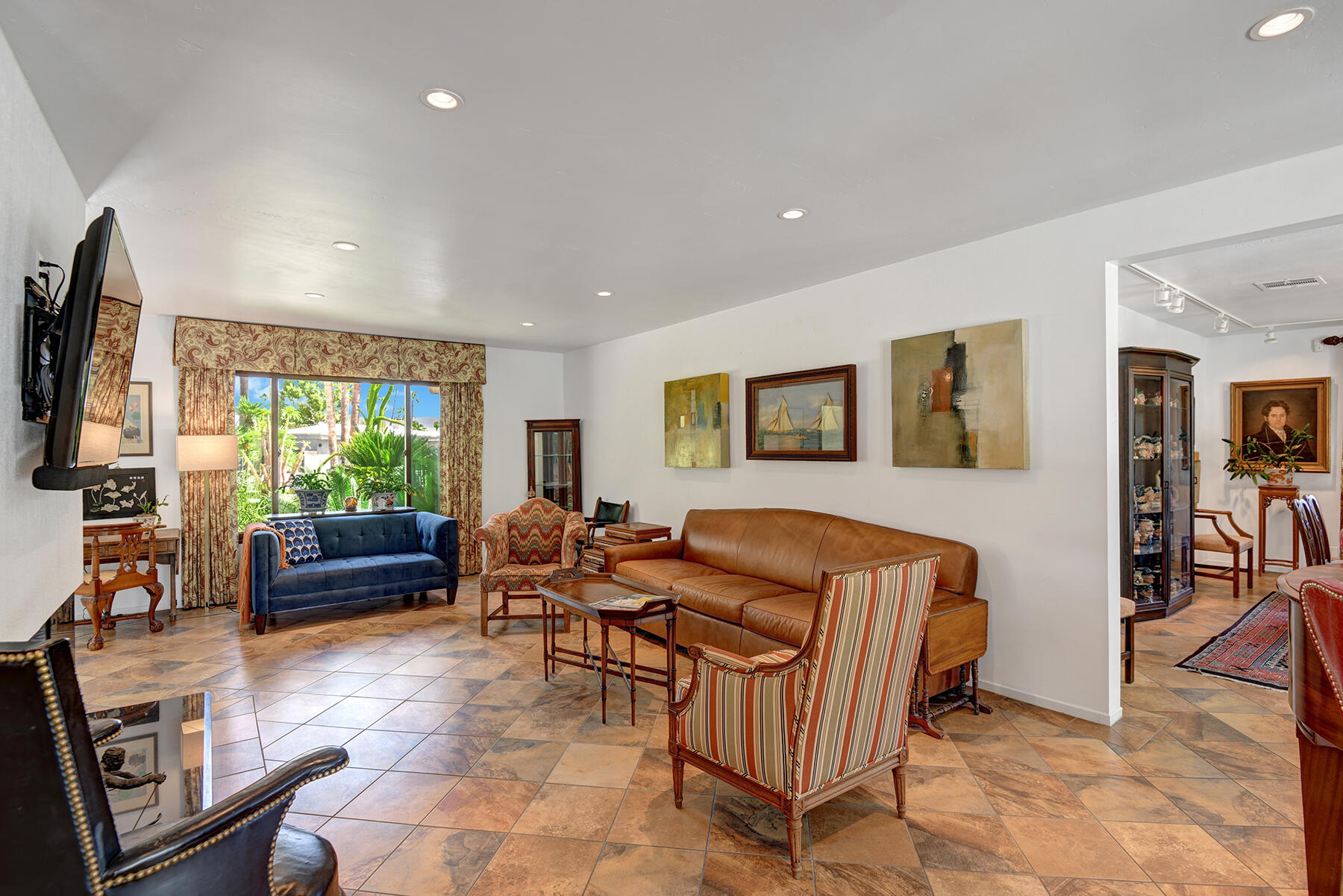 2915 Guadalupe Road Palm Springs, CA 92264 - Photo 17 of 52 a living room with furniture and a flat screen tv