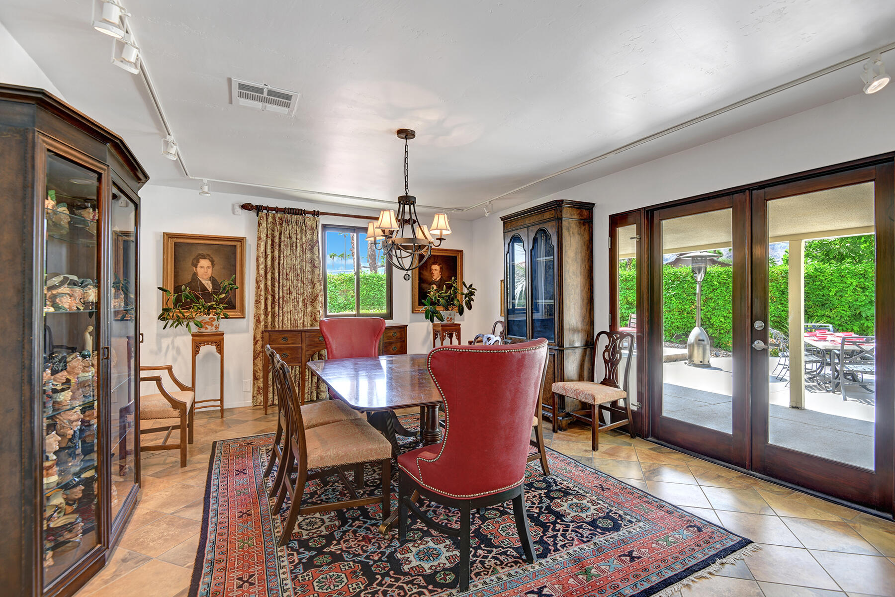 2915 Guadalupe Road Palm Springs, CA 92264 - Photo 18 of 52 a view of a dining room with furniture window and wooden floor
