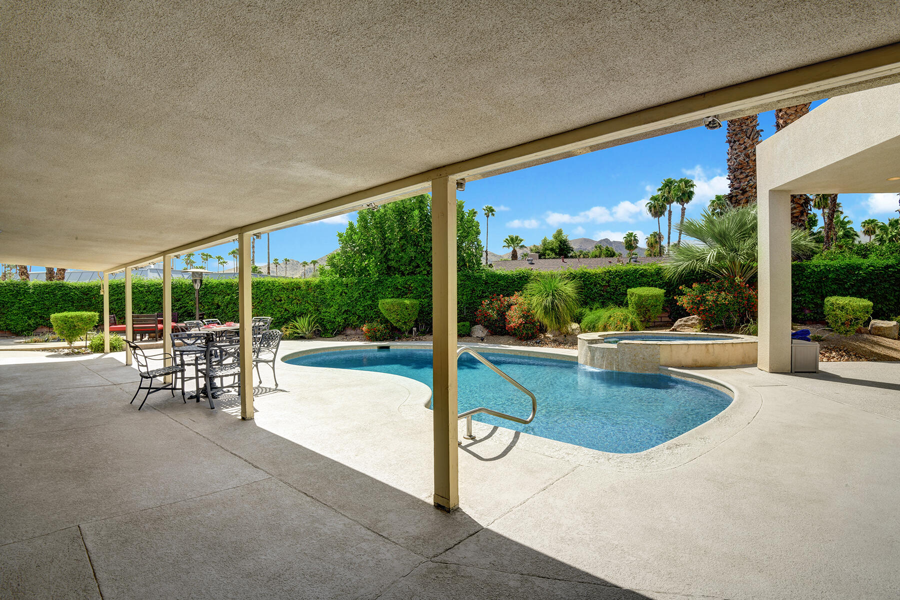 2915 Guadalupe Road Palm Springs, CA 92264 - Photo 30 of 52 a view of a swimming pool with a patio