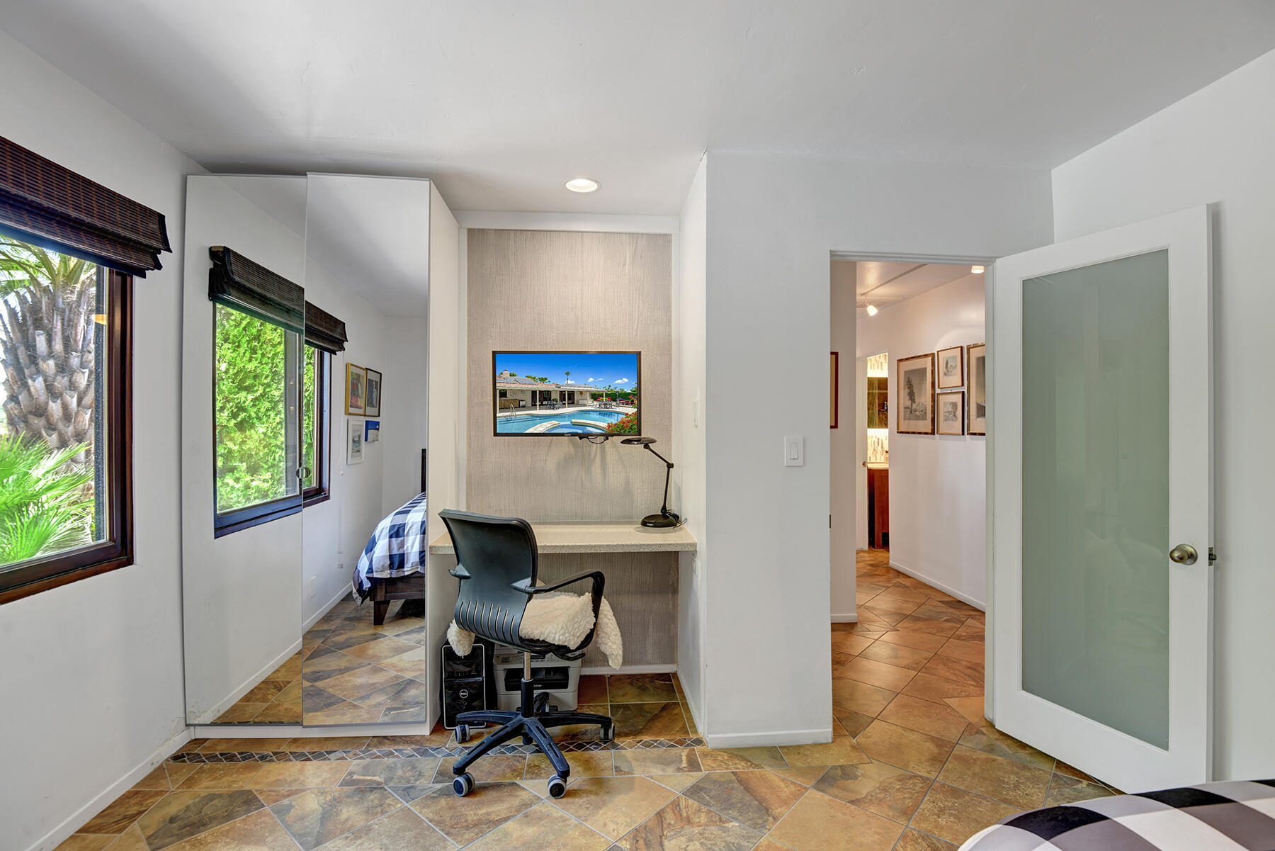 2915 Guadalupe Road Palm Springs, CA 92264 - Photo 32 of 52 a workspace with wooden floor and a bathroom