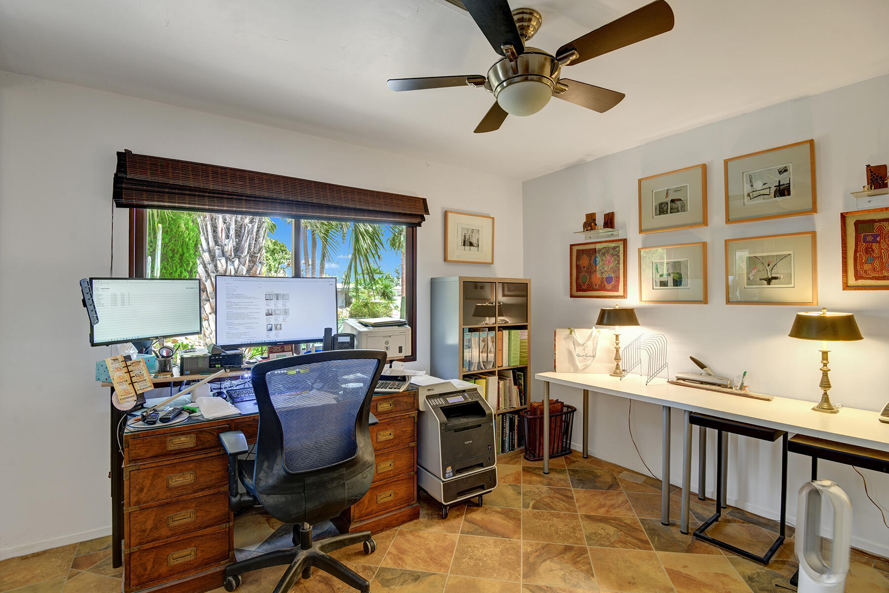 2915 Guadalupe Road Palm Springs, CA 92264 - Photo 35 of 52 a view of a workspace with furniture and a window