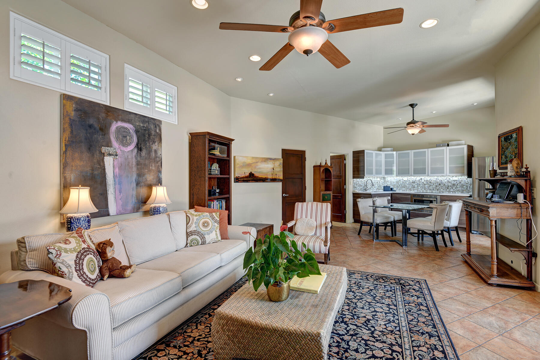 2915 Guadalupe Road Palm Springs, CA 92264 - Photo 45 of 52 a living room with furniture kitchen view and a chandelier