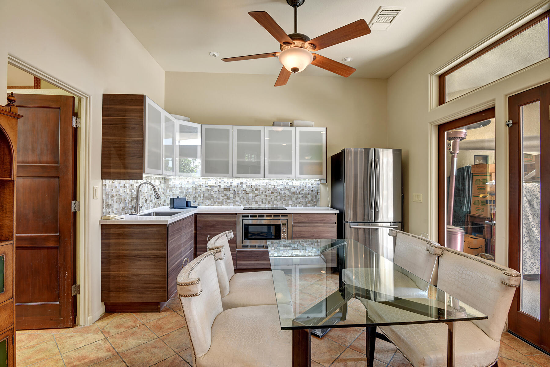 2915 Guadalupe Road Palm Springs, CA 92264 - Photo 46 of 52 a kitchen with stainless steel appliances granite countertop a refrigerator and a stove