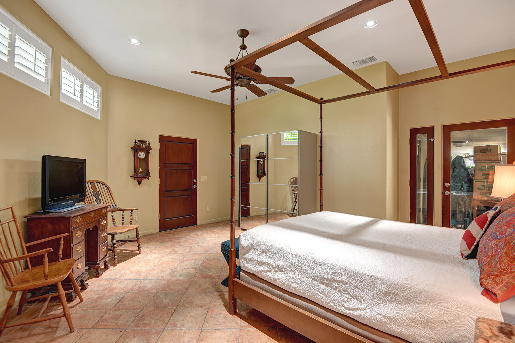 2915 Guadalupe Road Palm Springs, CA 92264 - Photo 48 of 52 a bedroom with a bed and a flat screen tv