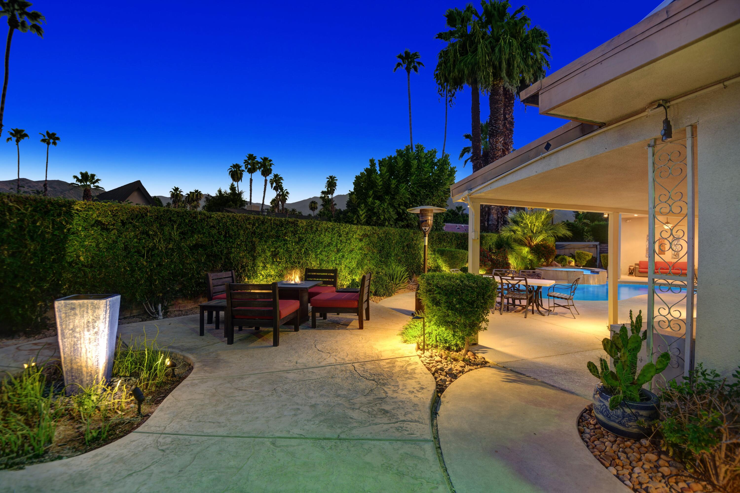 2915 Guadalupe Road Palm Springs, CA 92264 - Photo 8 of 52 a view of a swimming pool with a patio