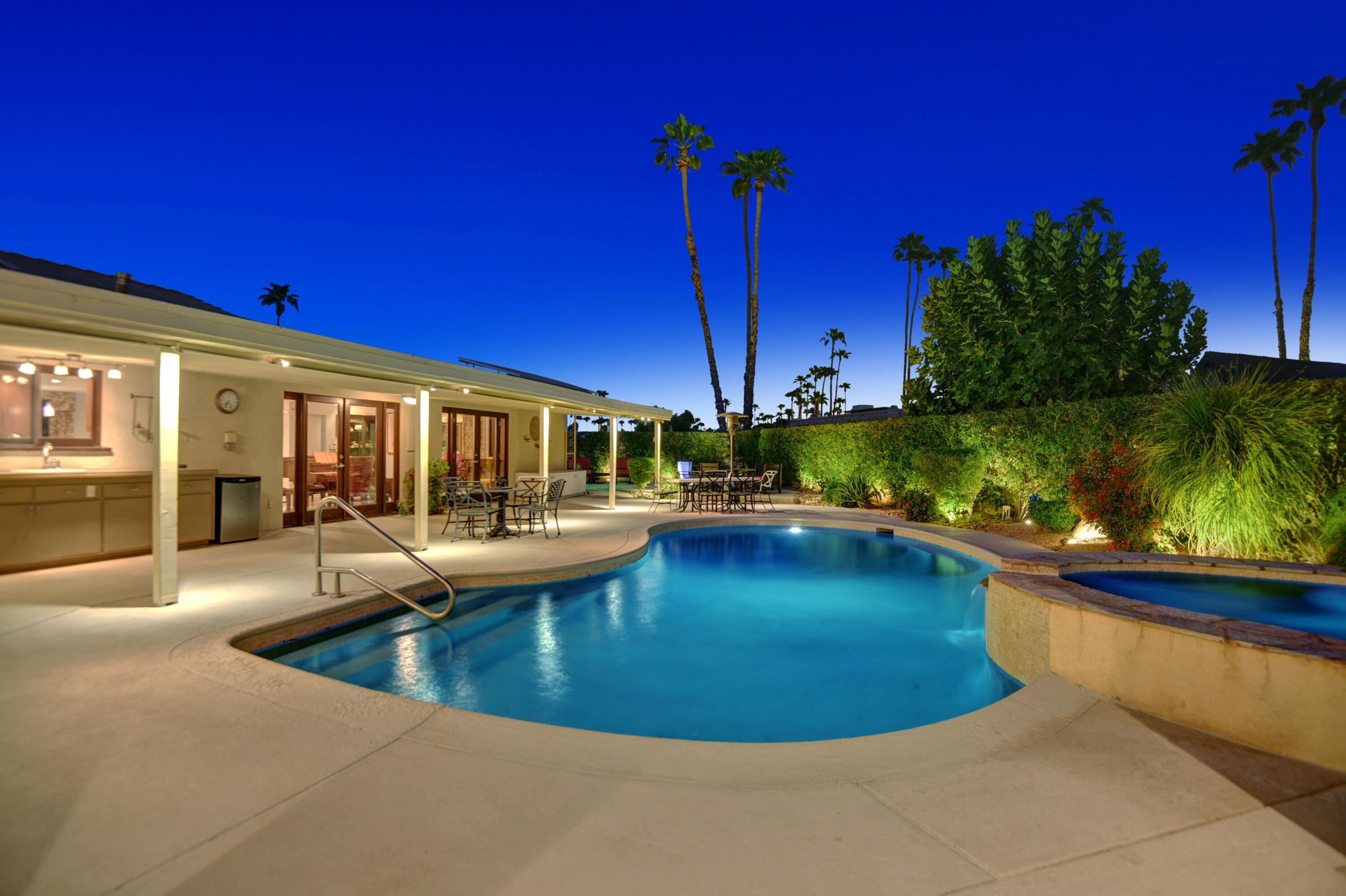 2915 Guadalupe Road Palm Springs, CA 92264 - Photo 9 of 52 a view of a swimming pool with chairs