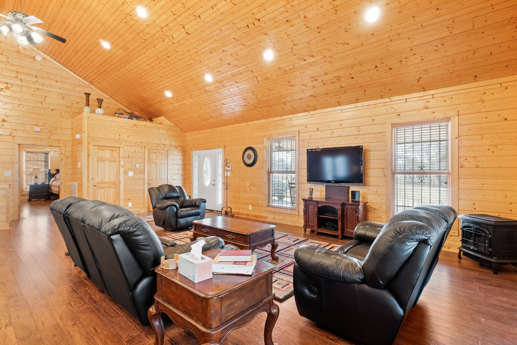 1760 Point Pleasant Road Buchanan, TN 38222 - Photo 22 of 50 a living room with fireplace furniture and a flat screen tv
