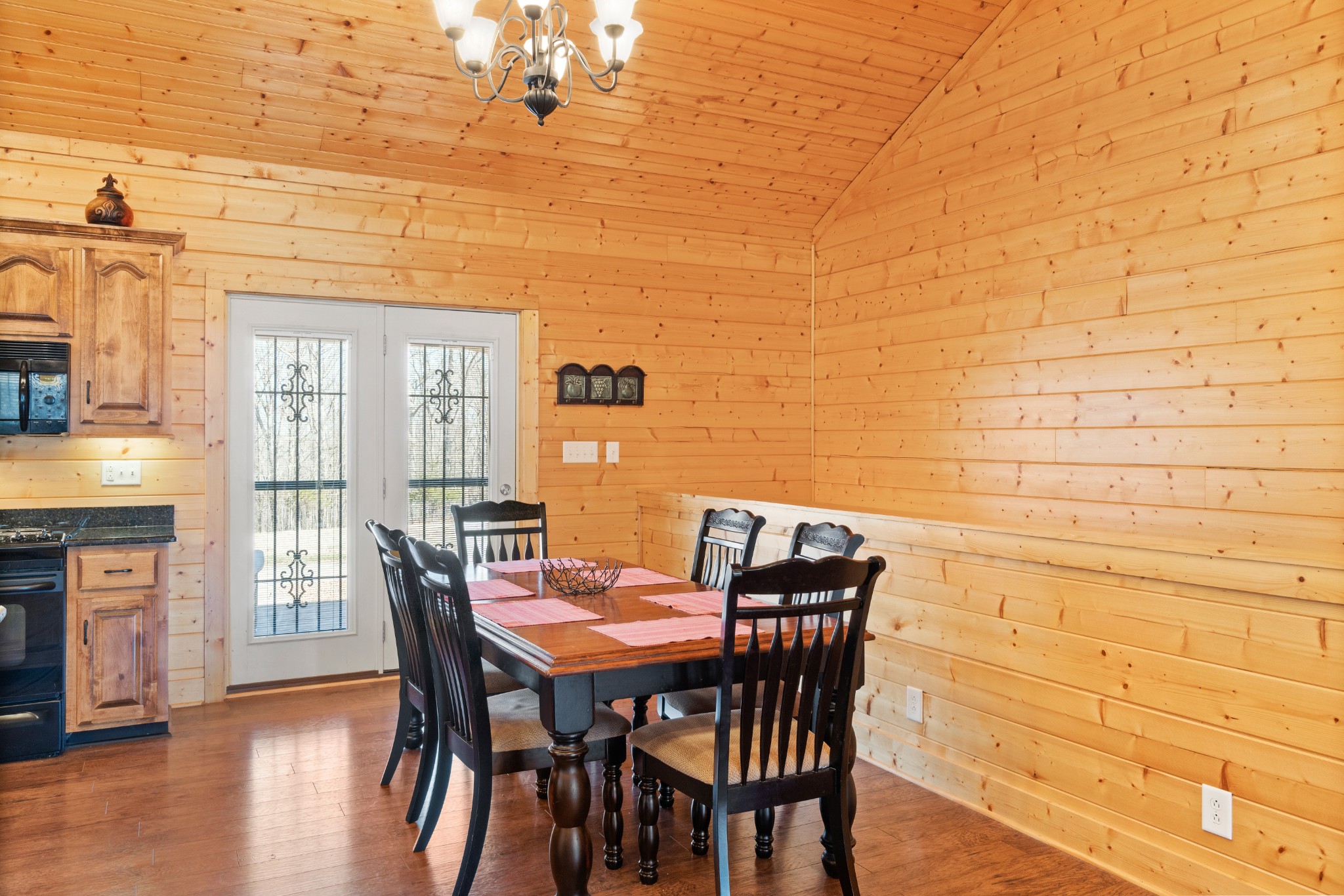 1760 Point Pleasant Road Buchanan, TN 38222 - Photo 23 of 50 a view of a dining room with furniture and wooden floor