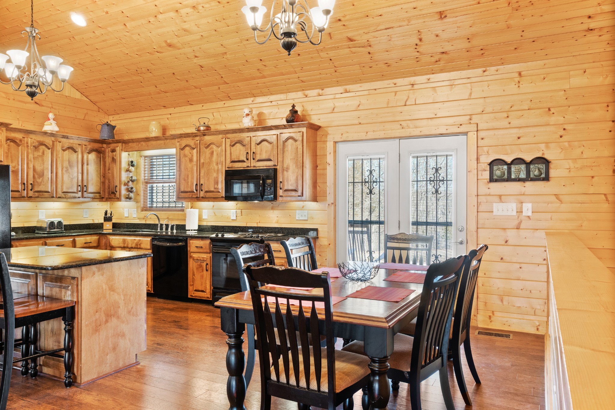 1760 Point Pleasant Road Buchanan, TN 38222 - Photo 24 of 50 a view of a dining room with furniture and wooden floor