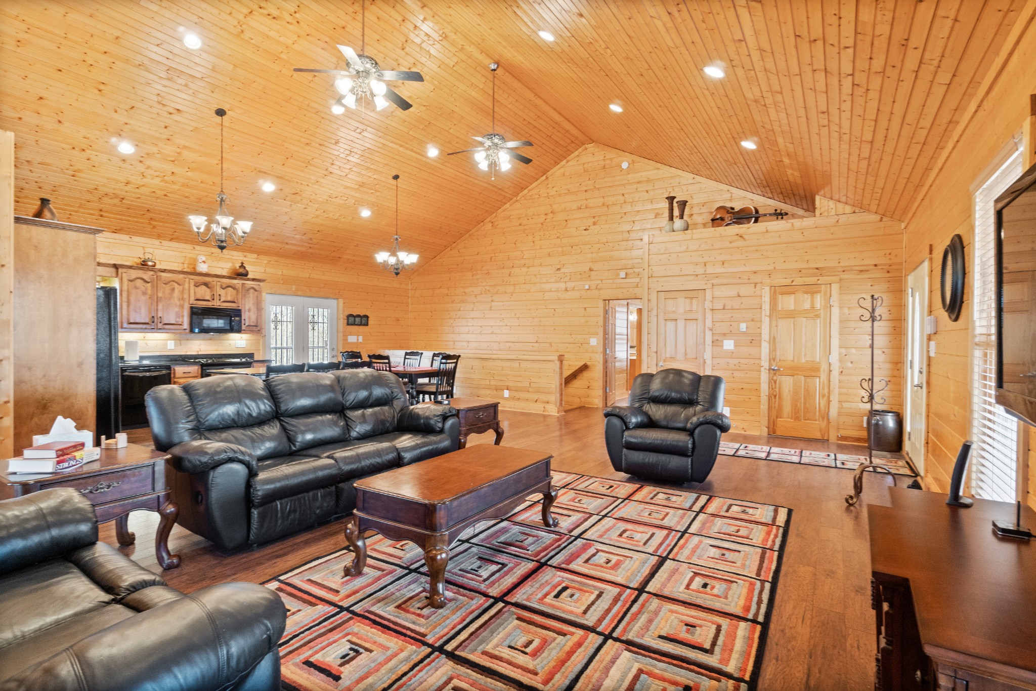 1760 Point Pleasant Road Buchanan, TN 38222 - Photo 25 of 50 a living room with furniture and a chandelier