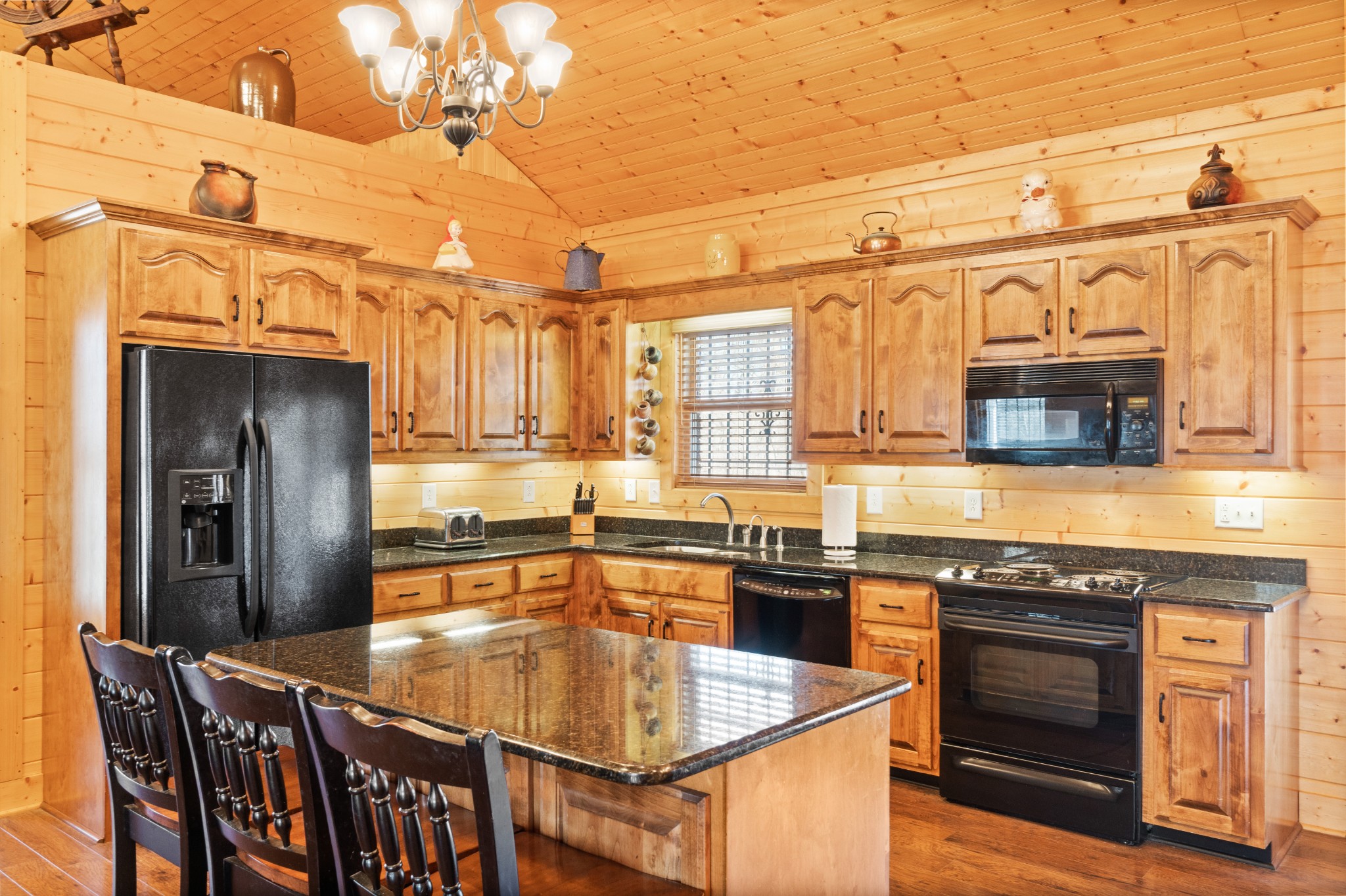 1760 Point Pleasant Road Buchanan, TN 38222 - Photo 28 of 50 a kitchen with stainless steel appliances granite countertop a sink a stove and a refrigerator