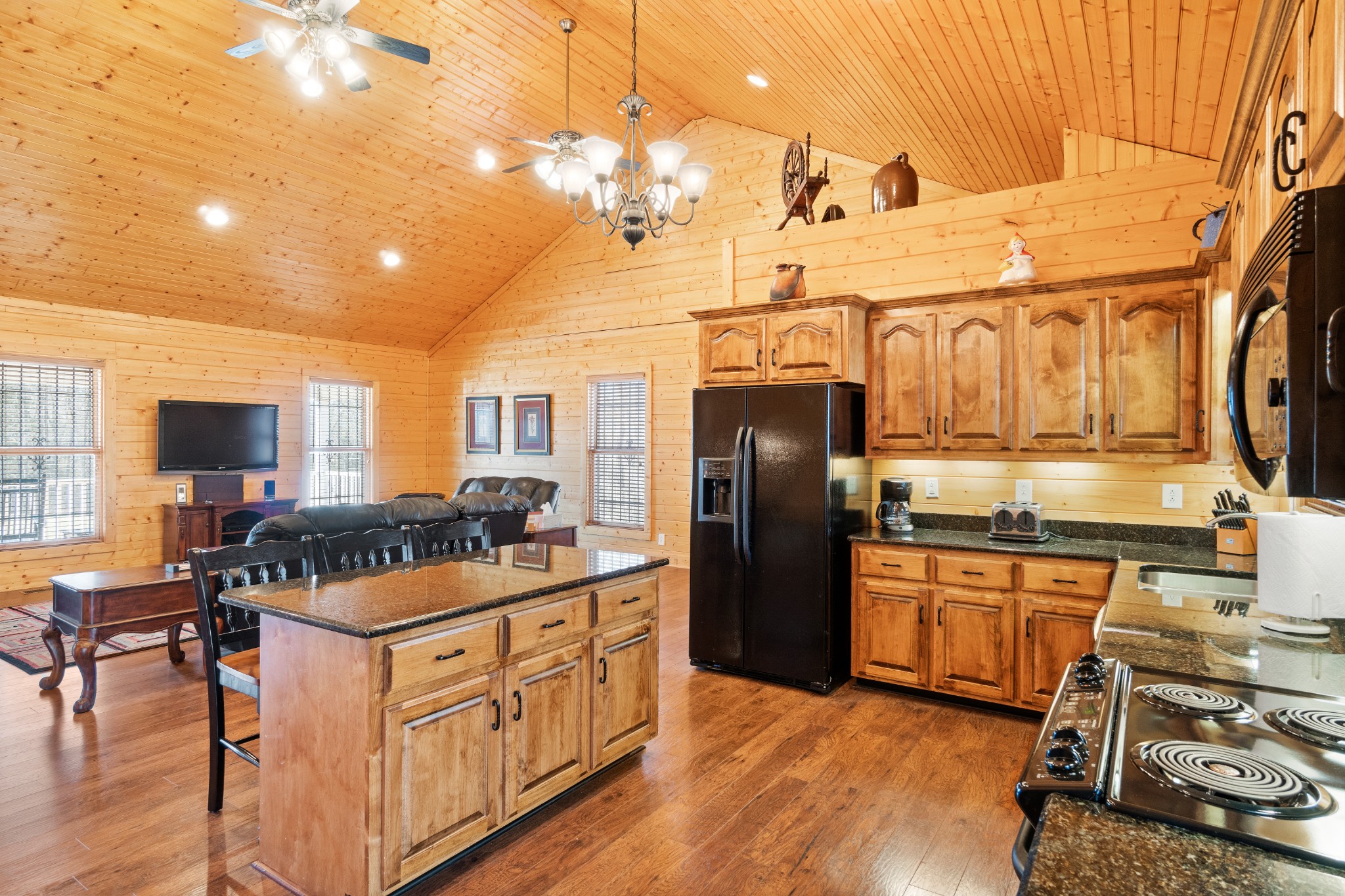 1760 Point Pleasant Road Buchanan, TN 38222 - Photo 30 of 50 a kitchen with stainless steel appliances granite countertop a stove and a refrigerator