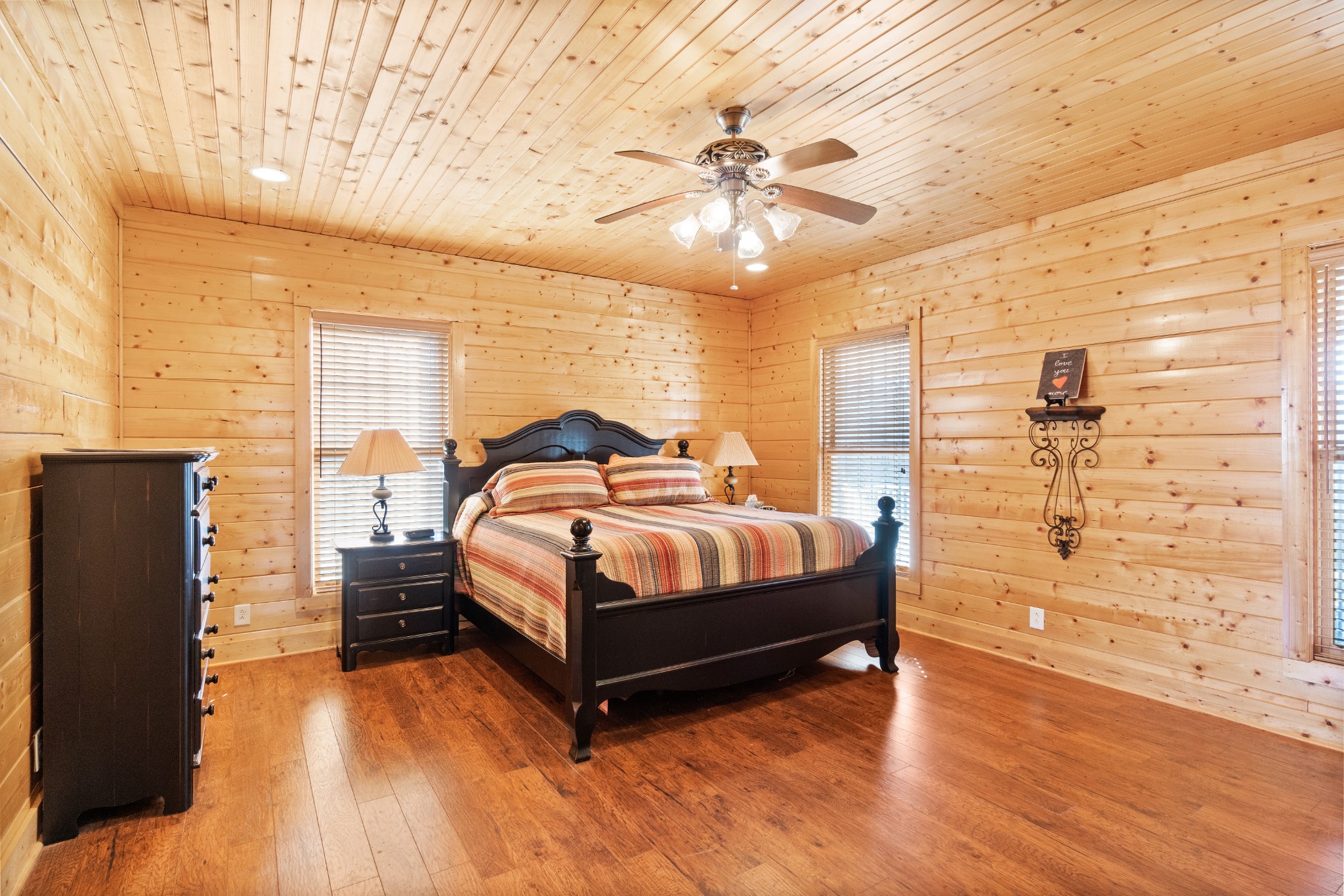 1760 Point Pleasant Road Buchanan, TN 38222 - Photo 31 of 50 a bedroom with a bed and wooden floor