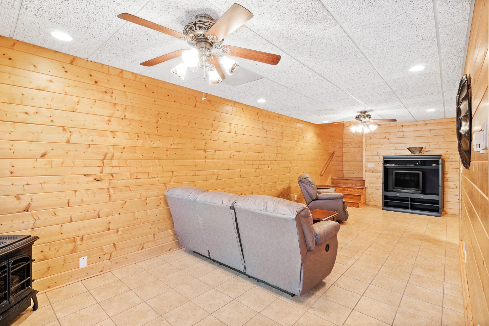 1760 Point Pleasant Road Buchanan, TN 38222 - Photo 38 of 50 a living room with fireplace furniture and a flat screen tv