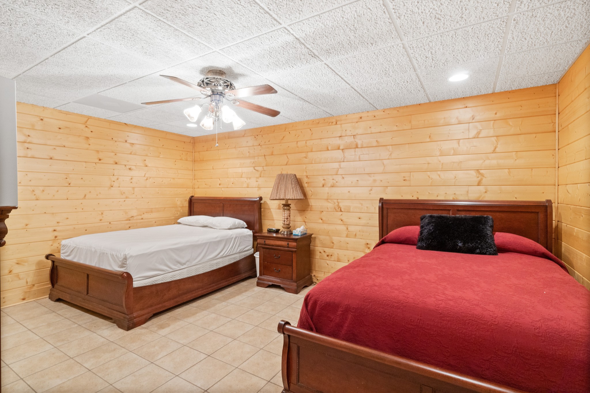 1760 Point Pleasant Road Buchanan, TN 38222 - Photo 40 of 50 a bedroom with 2 bed and a chandelier