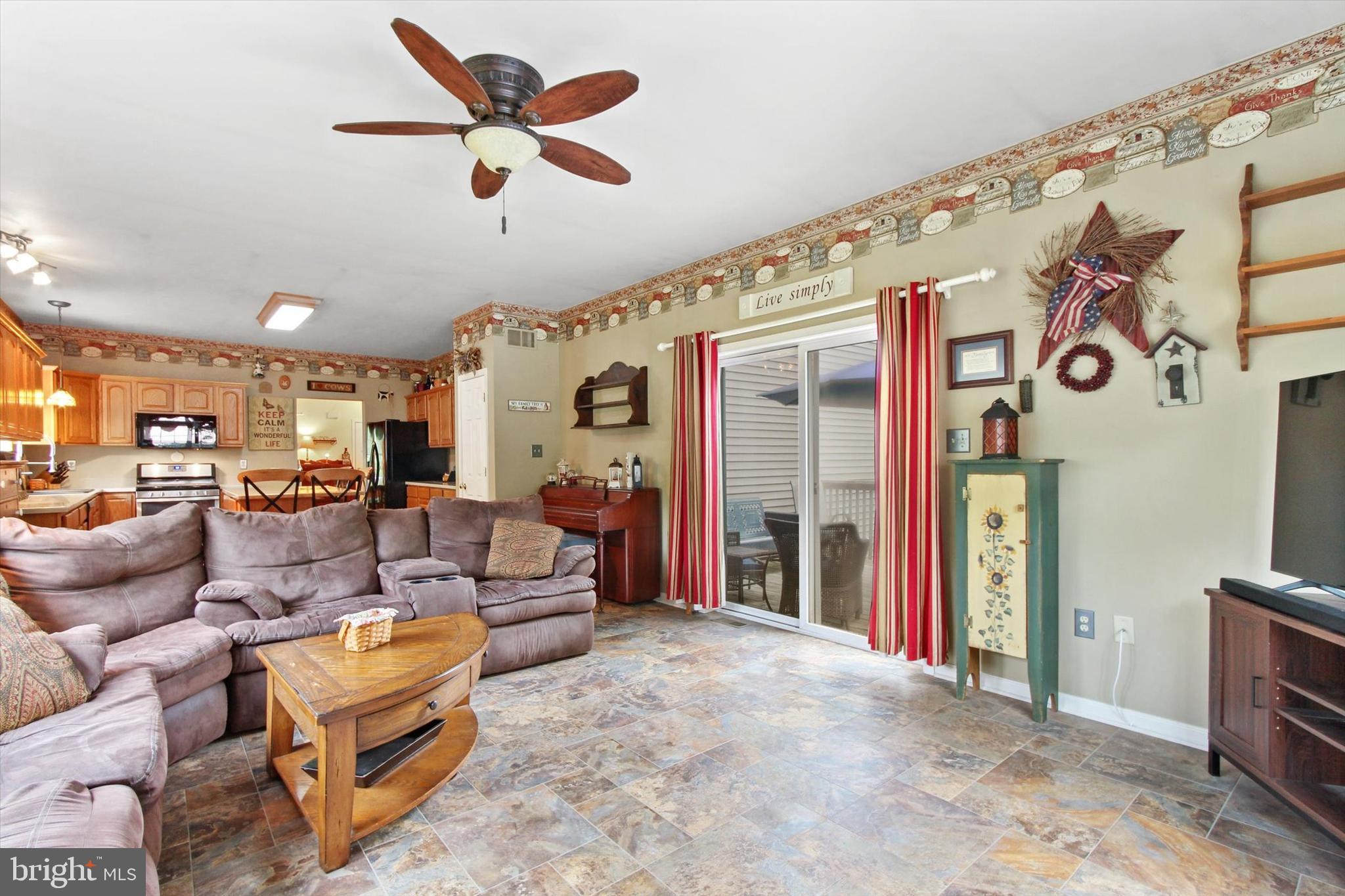 2115 Eden Road York, PA 17406 - Photo 8 of 28 Family Room Area & Access to Deck/Pool Area.