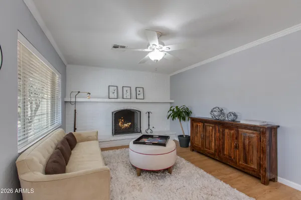 a view of a livingroom with furniture and stairs