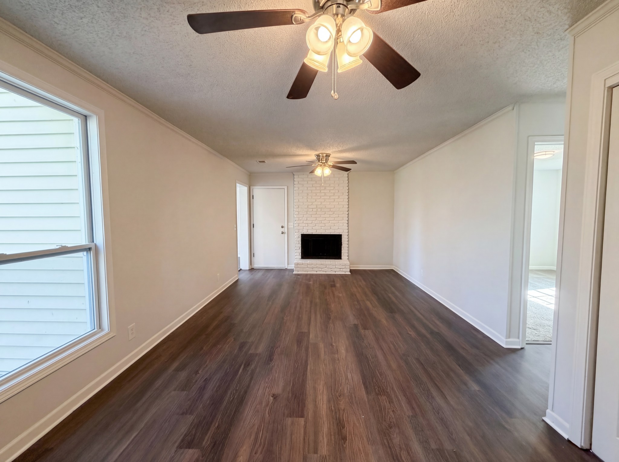5148 Roxborough Drive Hermitage, TN 37076 - Photo 12 of 19 wooden floor in an empty room with a window