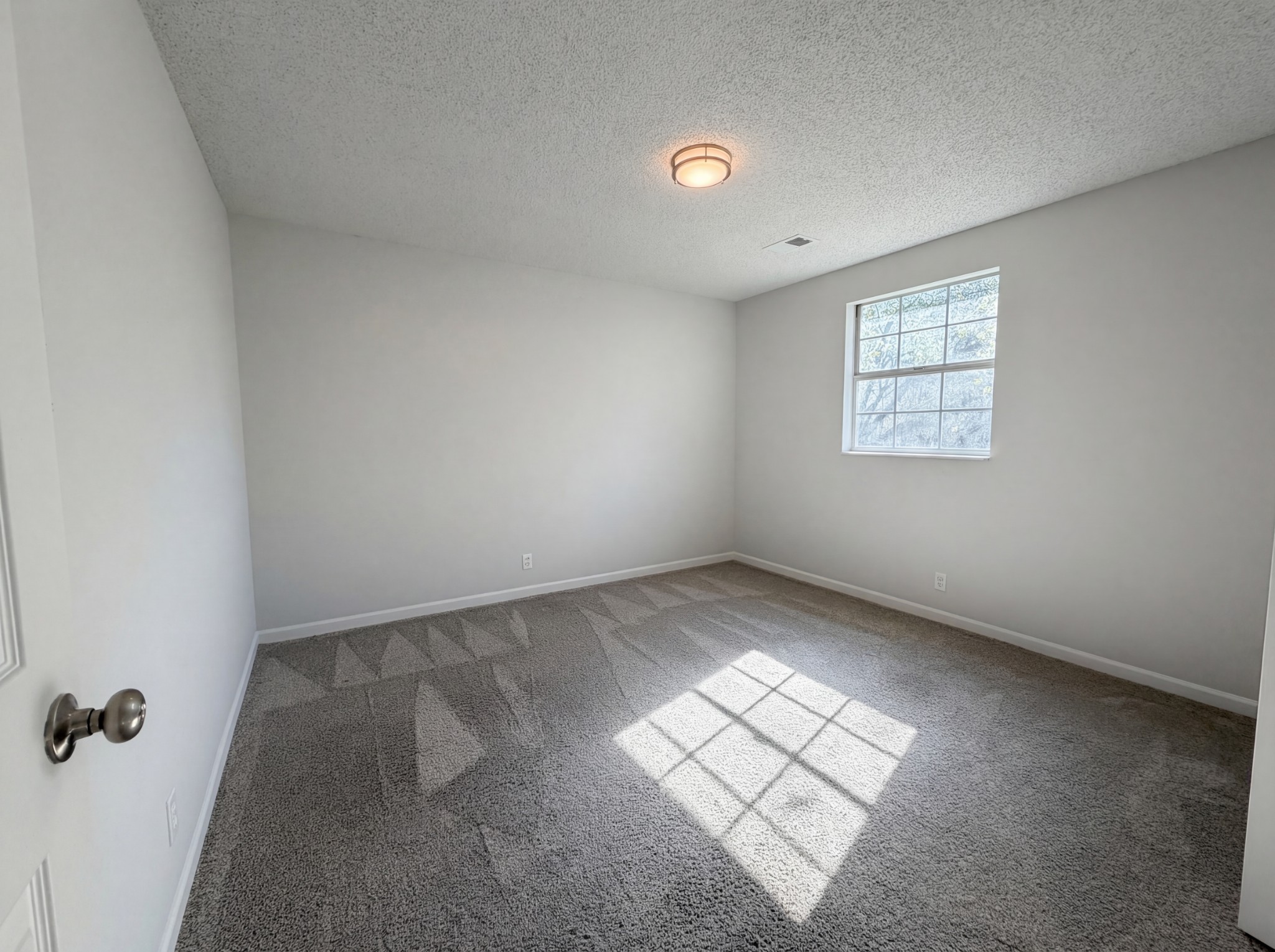 5148 Roxborough Drive Hermitage, TN 37076 - Photo 13 of 19 an empty room with a window