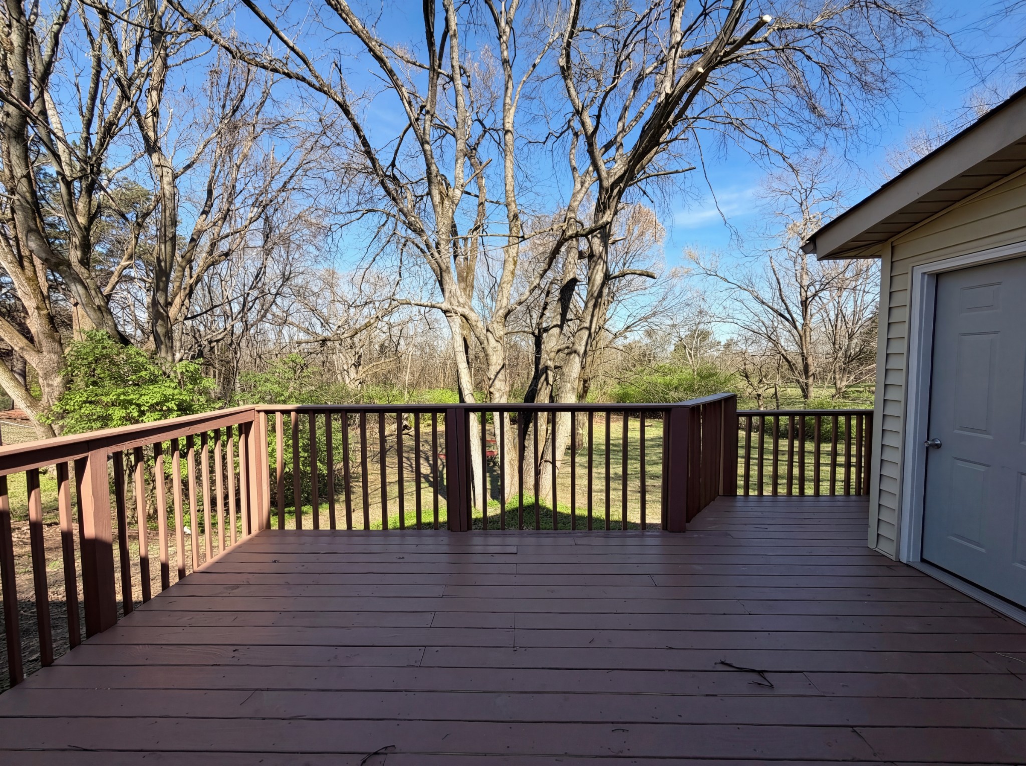 5148 Roxborough Drive Hermitage, TN 37076 - Photo 17 of 19 a balcony with wooden floor and fence
