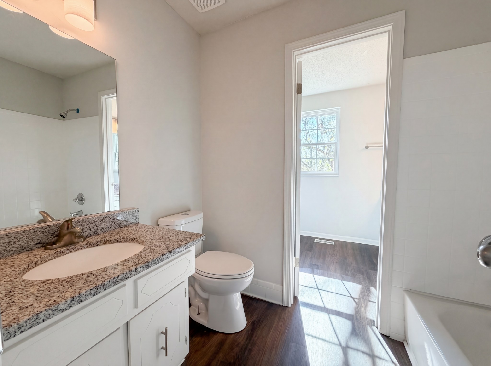 5148 Roxborough Drive Hermitage, TN 37076 - Photo 8 of 19 a bathroom with a granite countertop sink and a mirror