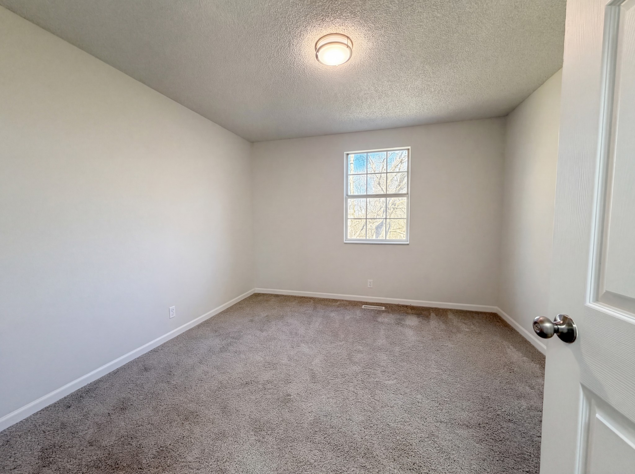 5148 Roxborough Drive Hermitage, TN 37076 - Photo 10 of 19 an empty room with a window