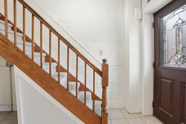 a view of an empty room with wooden roof