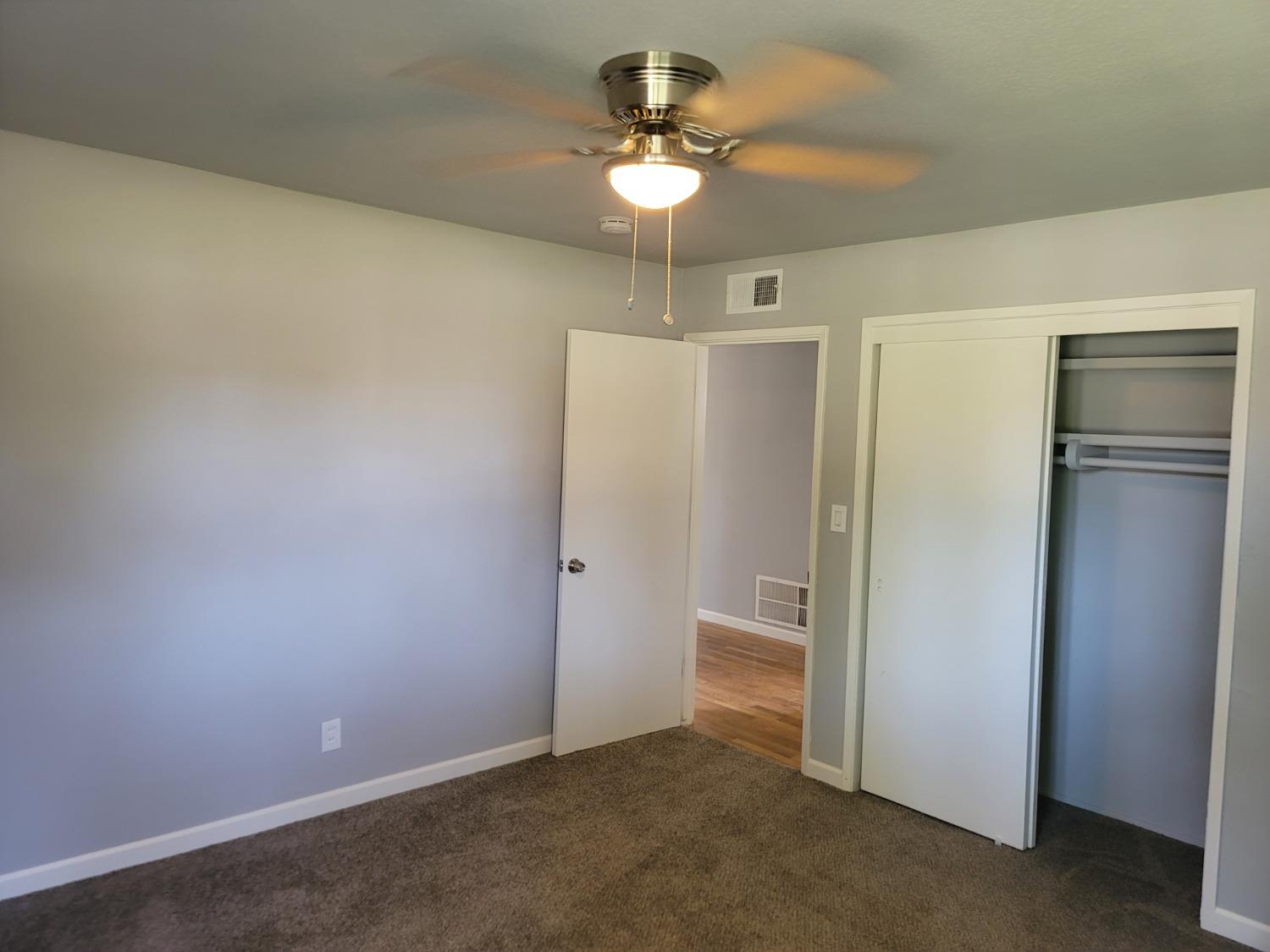 522 Willis Avenue Madera, CA 93637 - Photo 24 of 40 a view of a chandelier fan in a room
