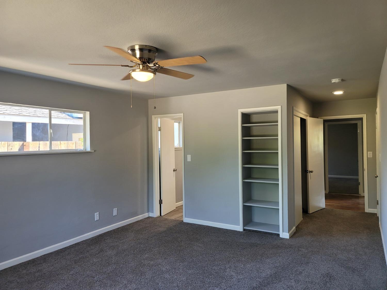 522 Willis Avenue Madera, CA 93637 - Photo 29 of 40 a view of an empty room with a window