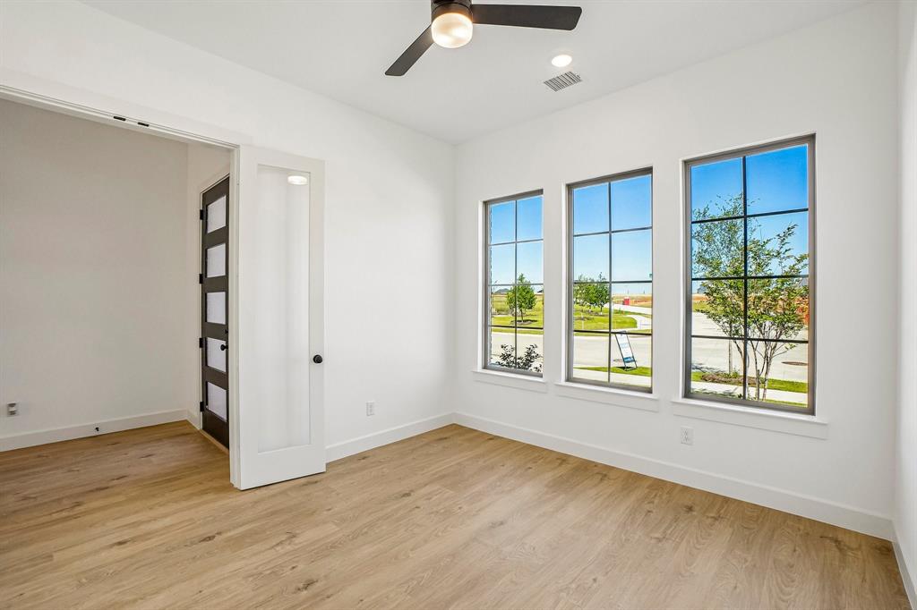 1516 Rose Mallow Road Celina, TX 75009 - Photo 6 of 22 The professional needing to work from home will appreciate this light, bright and private home office.