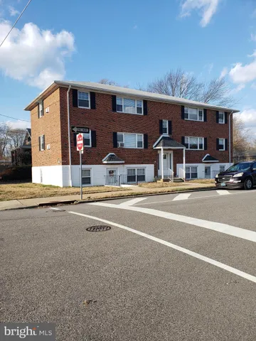 a view of building with a street