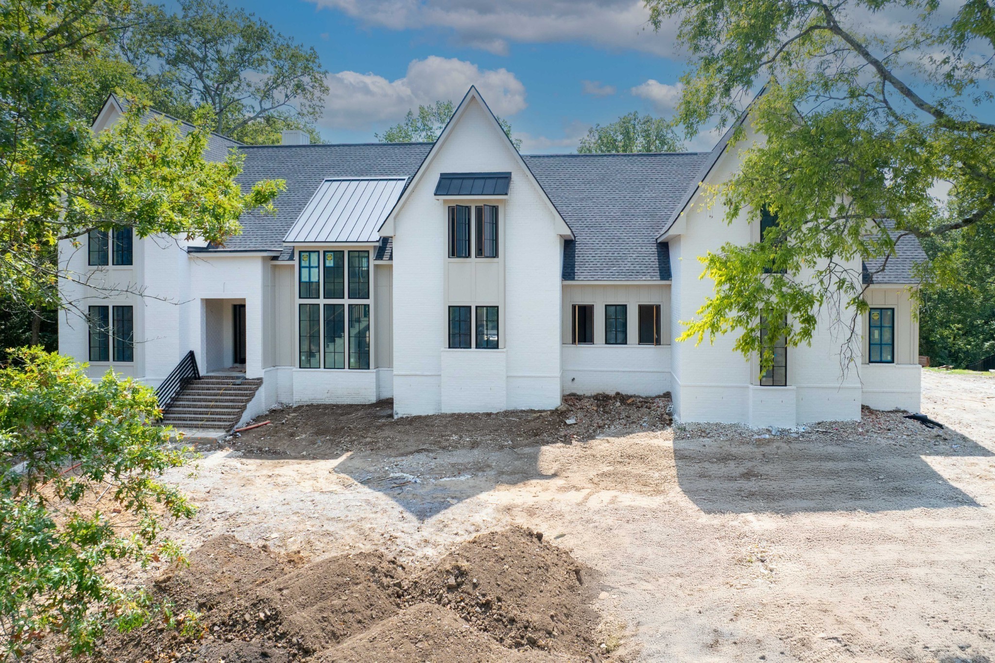 1019 Davidson Road Nashville, TN 37205 - Photo 2 of 6 a view of a grey house with a yard