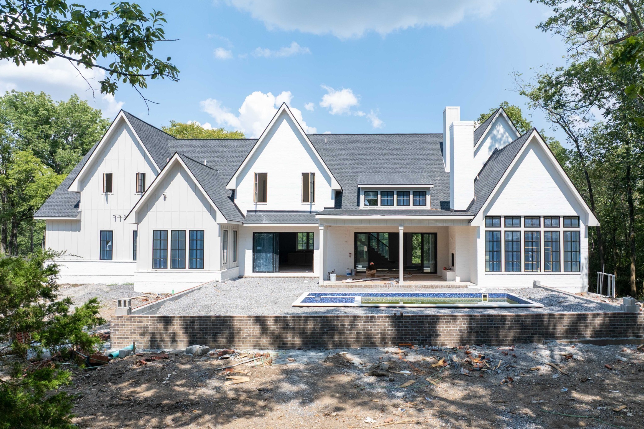 1019 Davidson Road Nashville, TN 37205 - Photo 4 of 6 a front view of a house with windows and trees