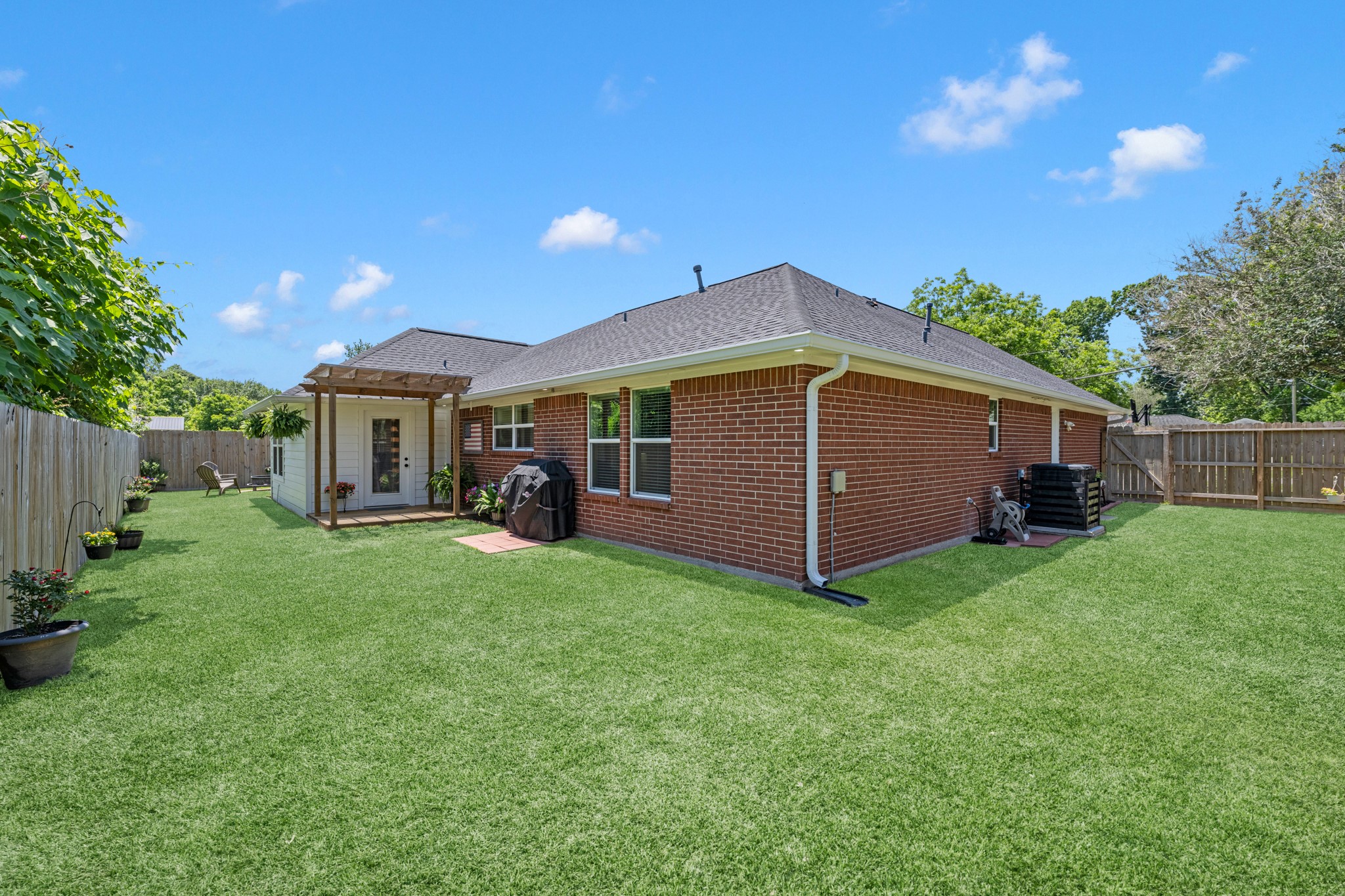 606 Walnut Street Sweeny, TX 77480 - Photo 26 of 28 a view of a house with backyard